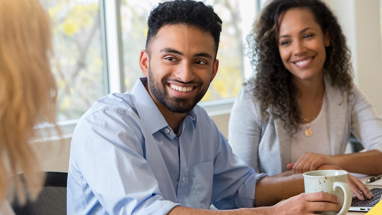man-with-goggles-and-hard-hat-in-red-uniform