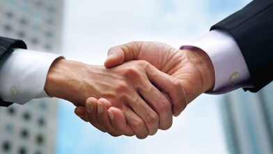 two men shaking hands