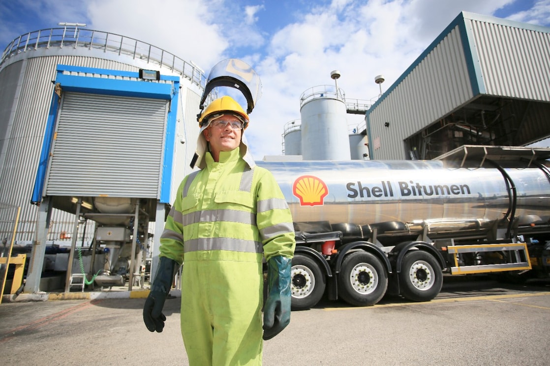 Truck driver with Shell bitumen tank