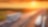 Befahrene Autobahn bei Sonnenuntergang