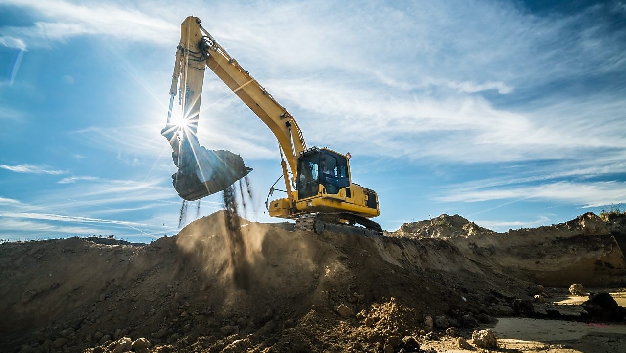 Bagger bei erdarbeiten