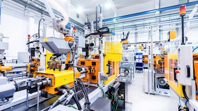 Automatisierte Fertigungslinie mit Maschinen und Schmiersystemen für eine effiziente Produktion