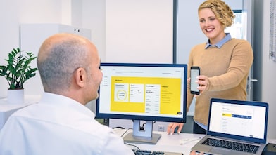 girl showing boss shell services page on her mobile
