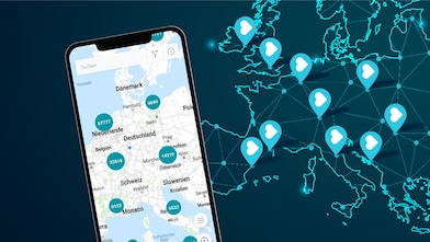 a girl standing near a car