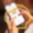 Woman using charge card at a Shell Recharge Station
