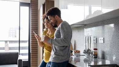 Modellhäuser mit Photovoltaik und Windrad