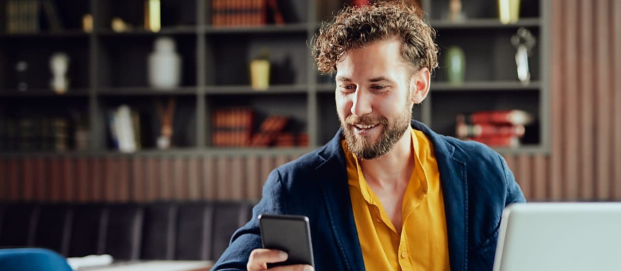 Young man in front of laptop