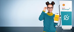 Young woman with shell recharge station