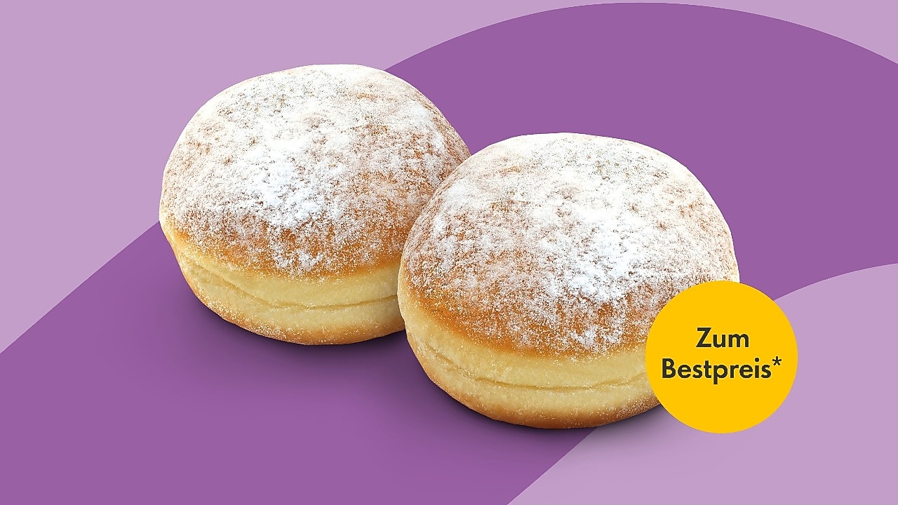 Zwei Berliner mit Puderzucker auf violettem Hintergrund. Gelber Störer mit Text: "Zum Bestrpreis*".